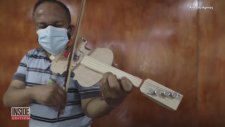 Perulu Müzik Öğretmeni Plastik Şişe ve Kontrplaktan Keman Üretiyor