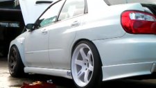 Subaru Impreza Wheel Change Art