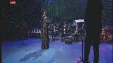 Aysun Gültekin-Yeşil Yaprak Arasında Kırmızı Gül Goncası-Şef:ömer Hayri Uzun