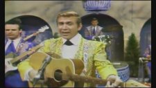 Buck Owens & His Buckaroos - I've Got A Tiger By The Tail