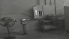 A Factory's Black And White Surveillance Video İn 1999